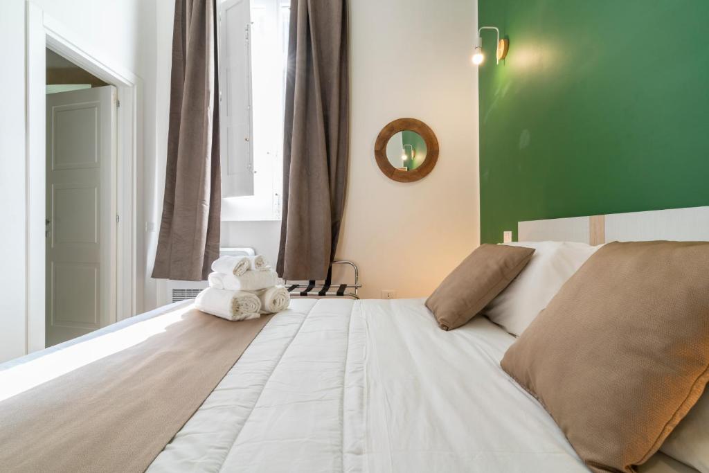 Postel nebo postele na pokoji v ubytování SoClà Boutique Hotel RTA