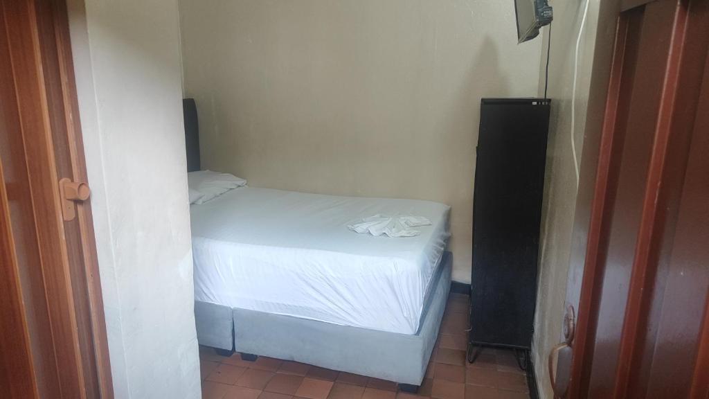 Postel nebo postele na pokoji v ubytování Nuevo hospedaje benny