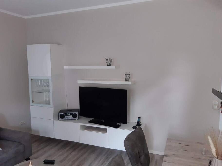 TV a/nebo společenská místnost v ubytování FEWO Happe