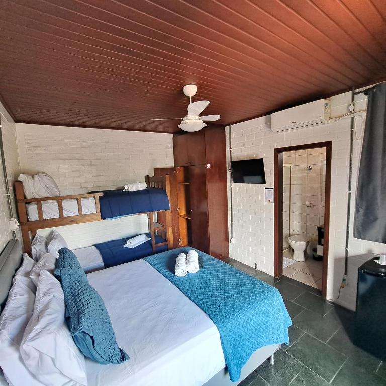 Postel nebo postele na pokoji v ubytování Pousada Trilha da Serra