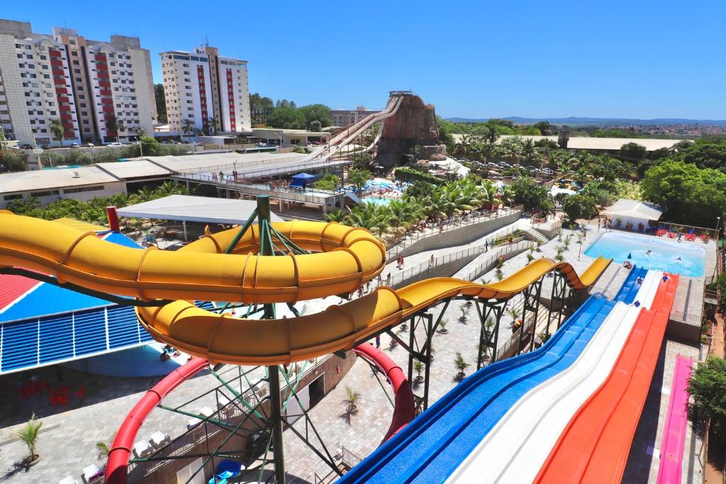 a roller coaster at a water park at Spazzio Diroma - com acesso Acqua Park in Caldas Novas