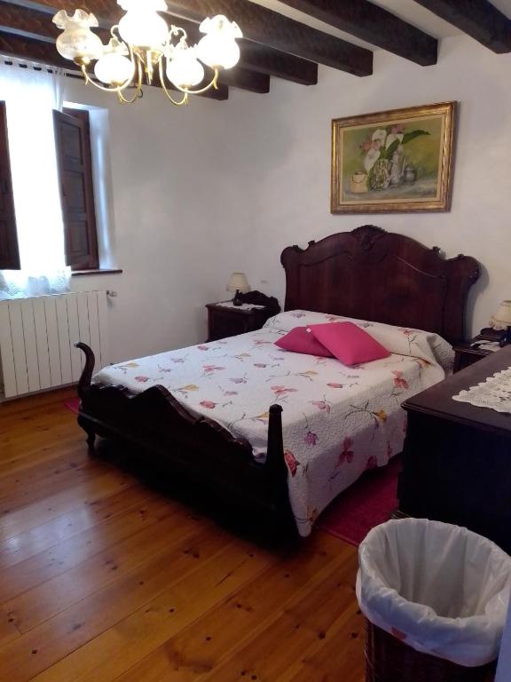 Postel nebo postele na pokoji v ubytování Casa Mari Paz Trasvía