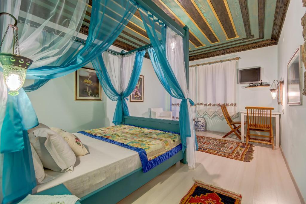 Postel nebo postele na pokoji v ubytování Datca Villa Asina