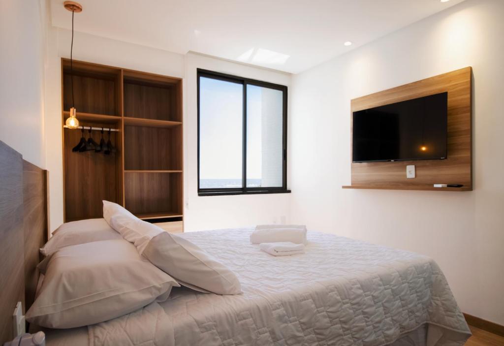 Postel nebo postele na pokoji v ubytování Ilhéus Praia Hotel