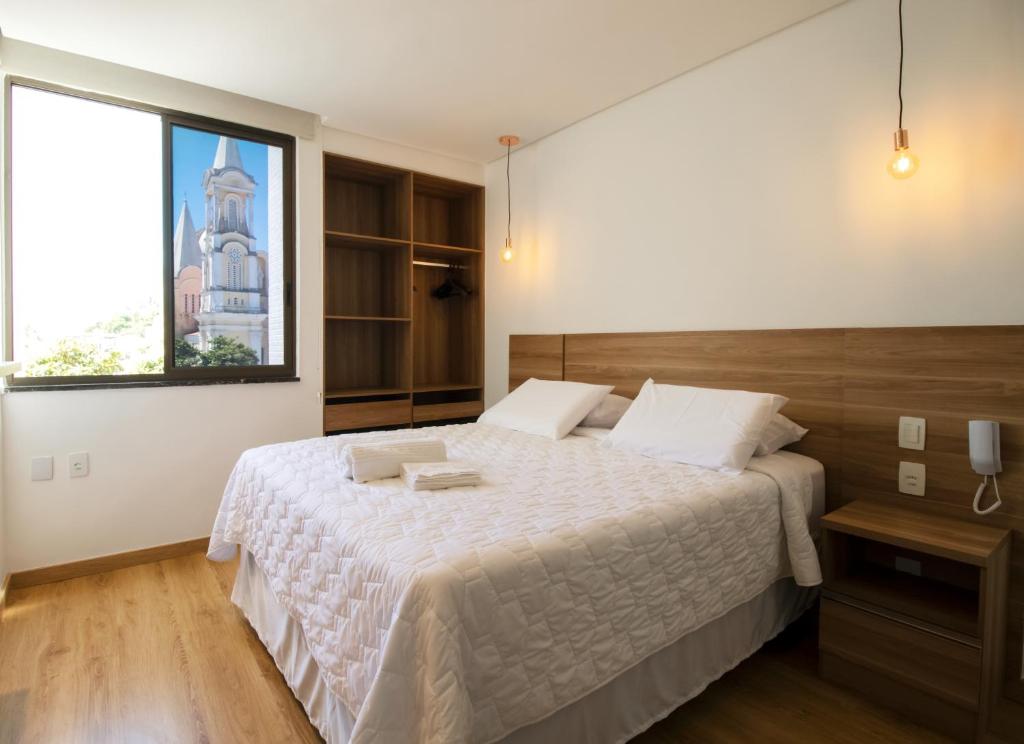 Postel nebo postele na pokoji v ubytování Ilhéus Praia Hotel