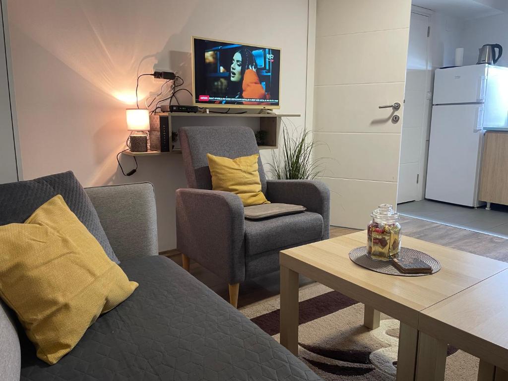 TV a/nebo společenská místnost v ubytování Apartman Una
