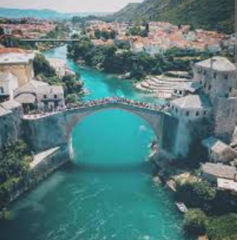 an aerial view of a bridge over a river at Bonita in Mostar