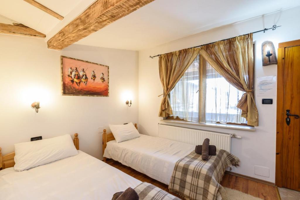Postel nebo postele na pokoji v ubytování Chalet Garibaldi - Total Chalets