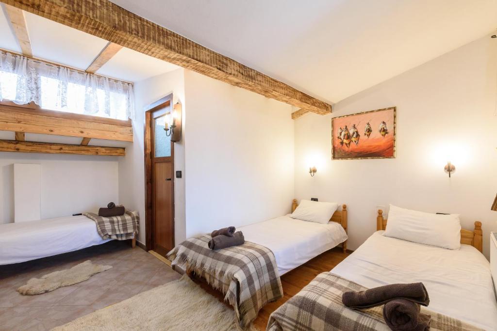 Postel nebo postele na pokoji v ubytování Chalet Garibaldi - Total Chalets