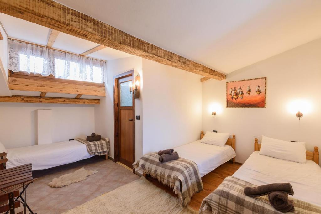 Postel nebo postele na pokoji v ubytování Chalet Garibaldi - Total Chalets
