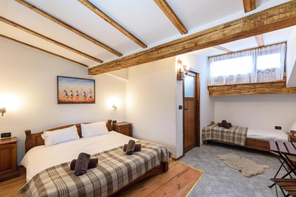 Postel nebo postele na pokoji v ubytování Chalet Garibaldi - Total Chalets