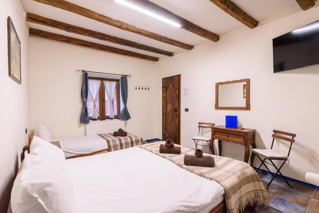 Postel nebo postele na pokoji v ubytování Chalet Garibaldi - Total Chalets