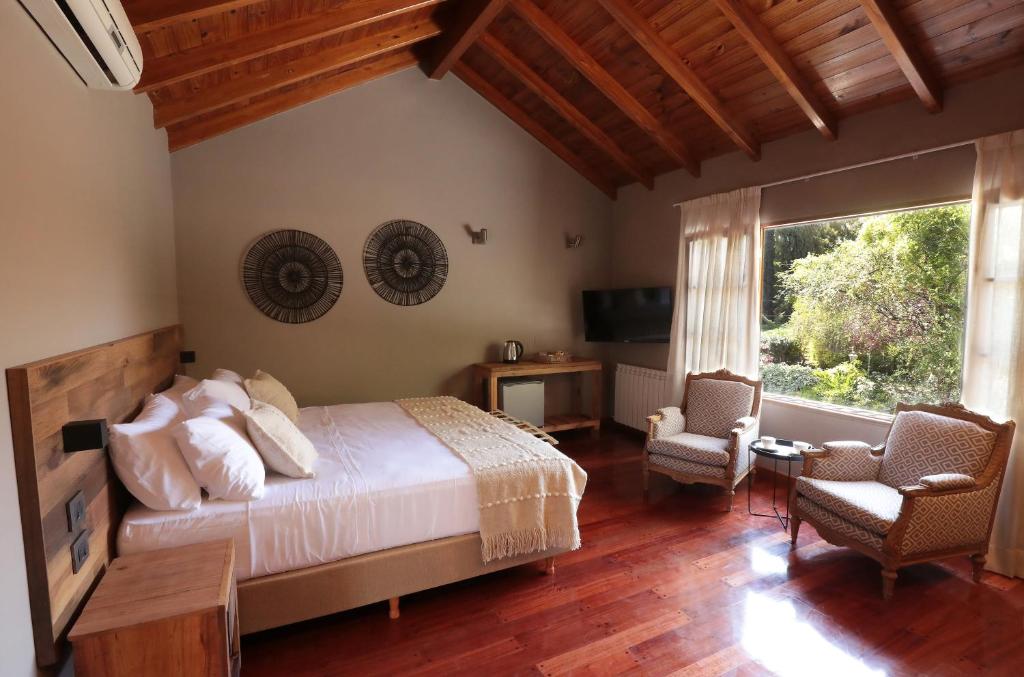 Postel nebo postele na pokoji v ubytování Heura Petit Hotel