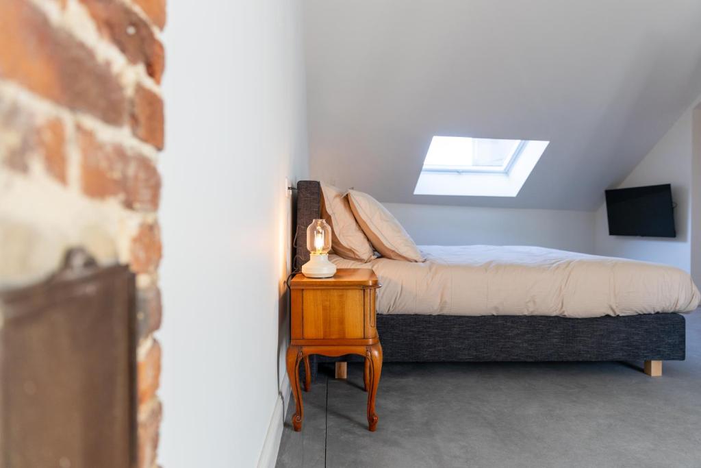Postel nebo postele na pokoji v ubytování Li Ter Hôtel