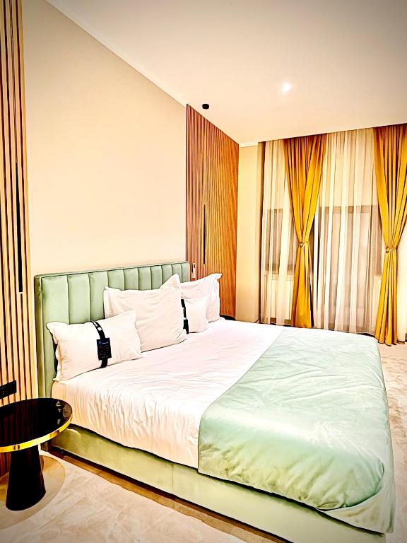 Postel nebo postele na pokoji v ubytování Hotel Clipa