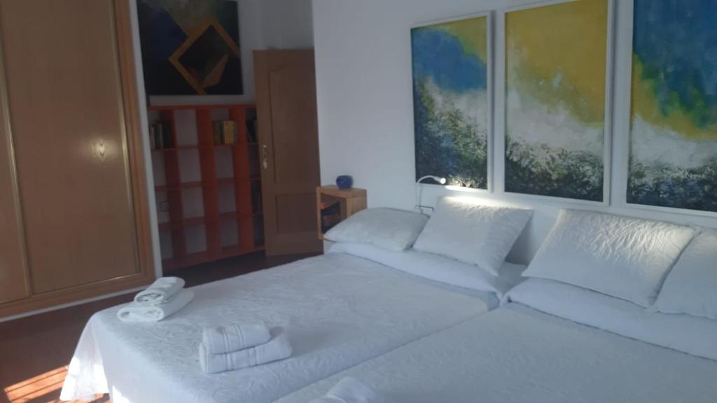 Postel nebo postele na pokoji v ubytování Villa Family Kids "Joropillo" - Full house rent