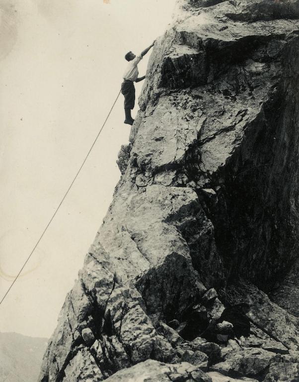 a man standing on the side of a mountain at Apartment mit Zugspitzblick in Grainau