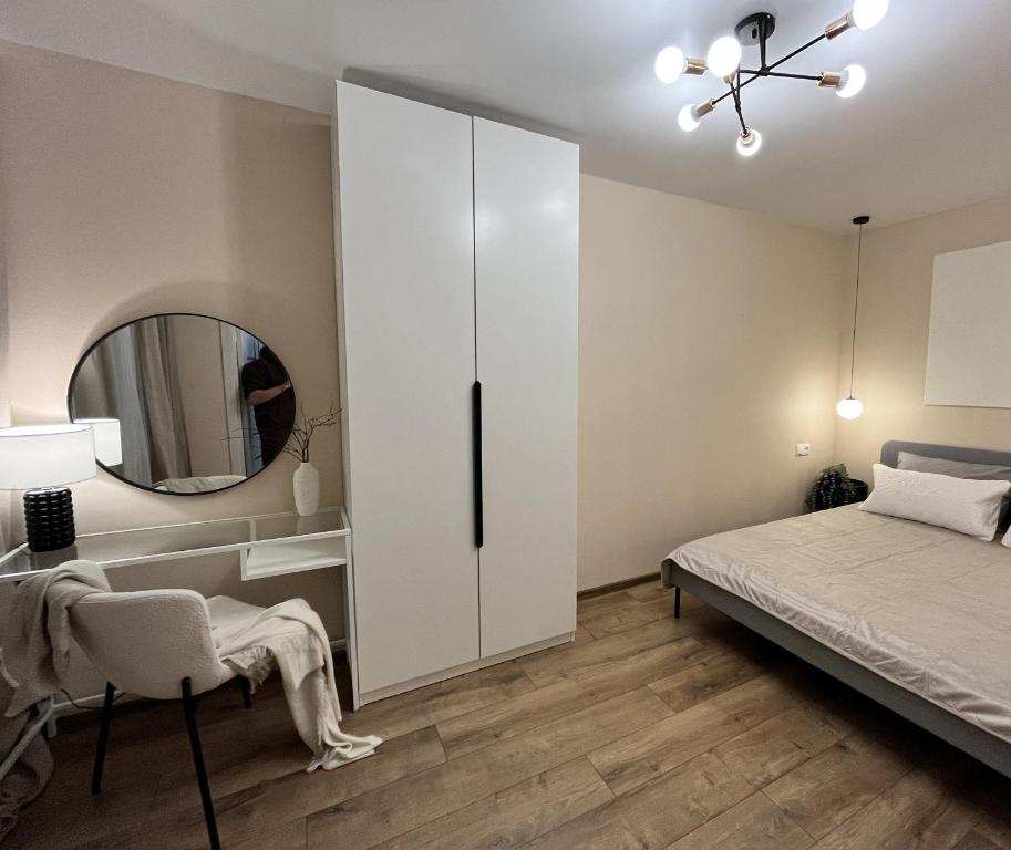 Postel nebo postele na pokoji v ubytování New Charm Apartments near Border