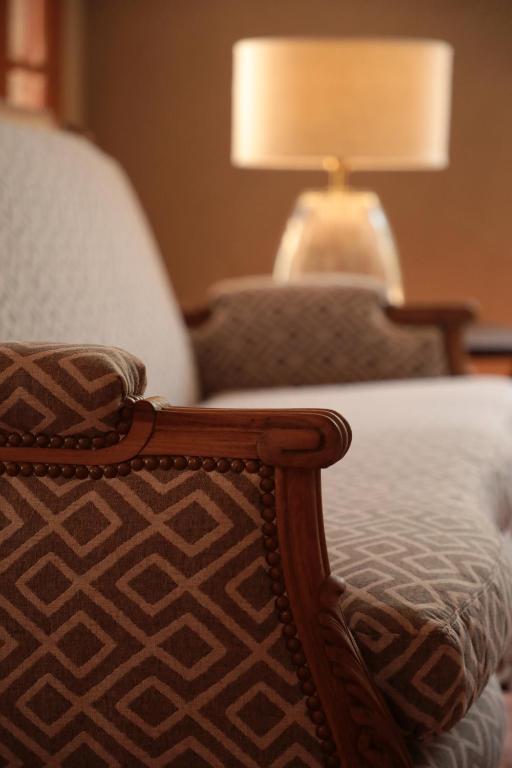Postel nebo postele na pokoji v ubytování Heura Petit Hotel
