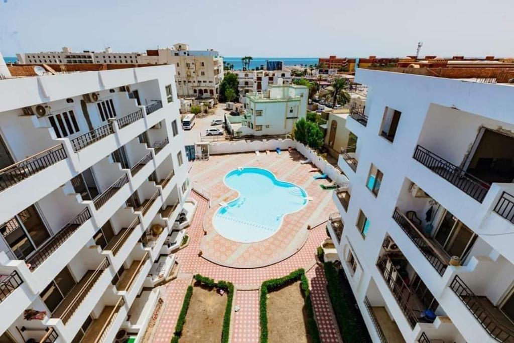 an aerial view of a courtyard in a apartment building at Al Makramia compound in Hurghada