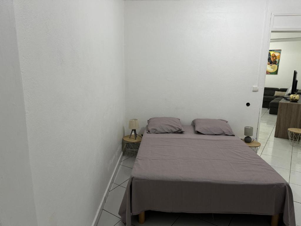 Postel nebo postele na pokoji v ubytování Domaine de la villa d’orge