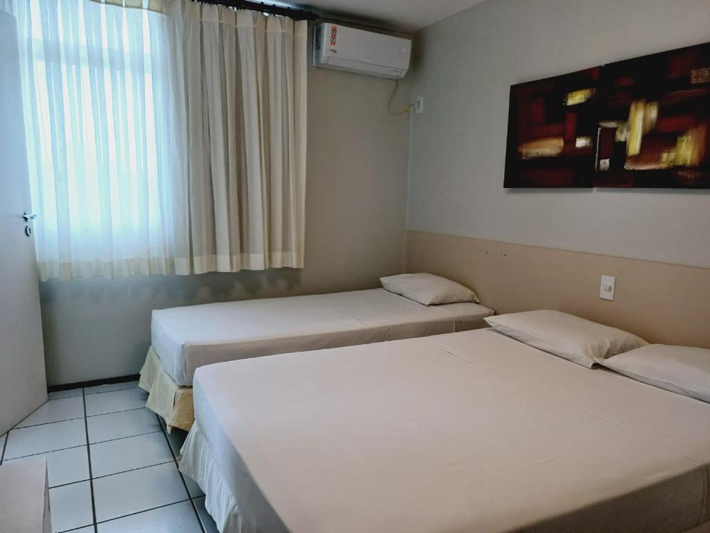 Postel nebo postele na pokoji v ubytování Gran lençóis Flat 2 suítes vista piscina
