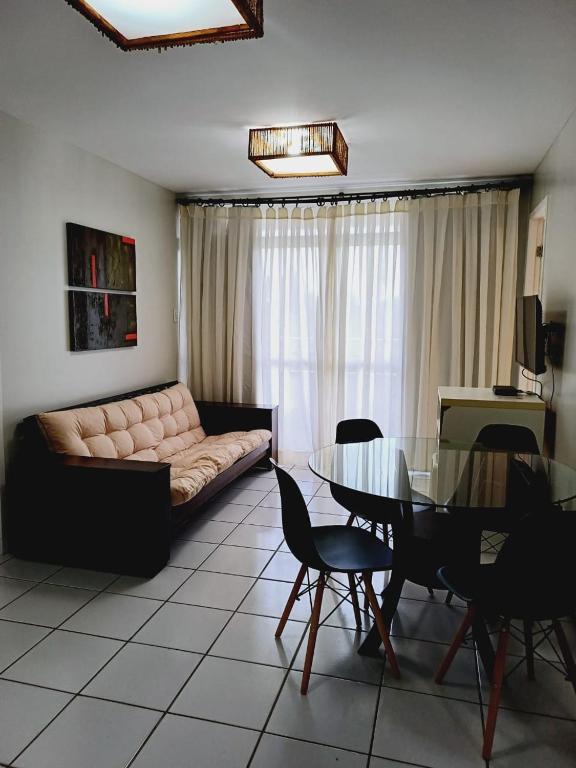 Posezení v ubytování Gran lençóis Flat 2 suítes vista piscina