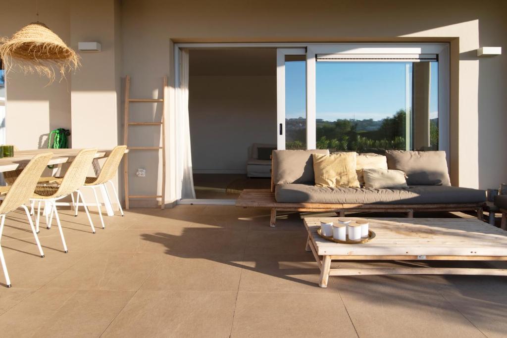 A seating area at Chic 3BR Haven - Luxury Ground Floor - La Cala Golf