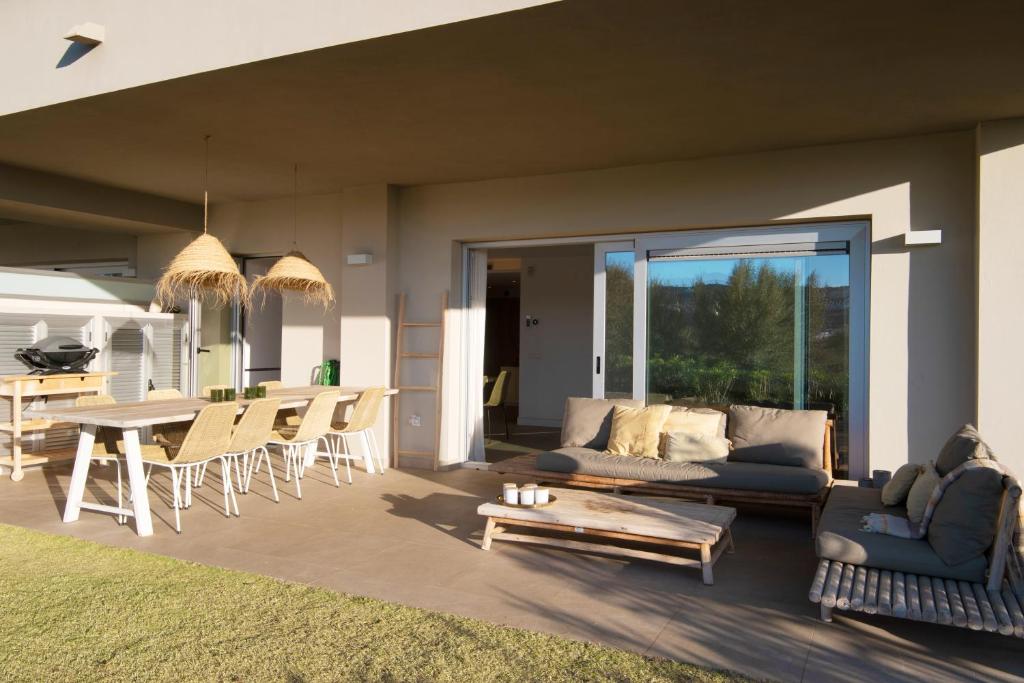 A seating area at Chic 3BR Haven - Luxury Ground Floor - La Cala Golf