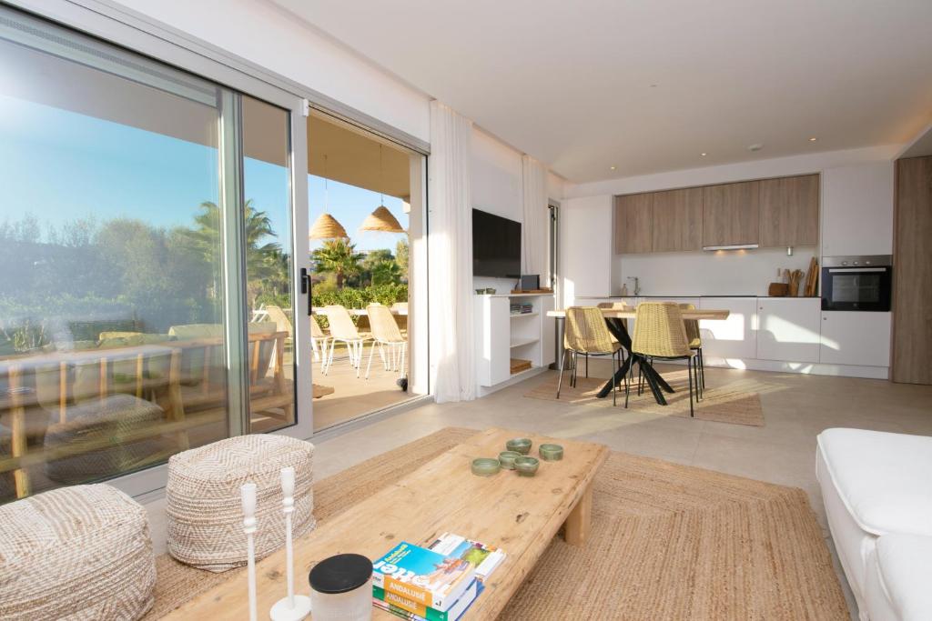 A television and/or entertainment centre at Chic 3BR Haven - Luxury Ground Floor - La Cala Golf