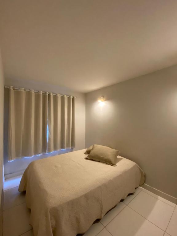 מיטה או מיטות בחדר ב-Chalé Oxente em Corumbau-BA