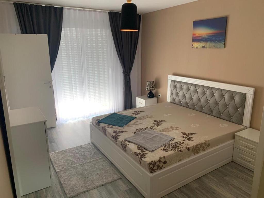 Postel nebo postele na pokoji v ubytování Apartments Divoli