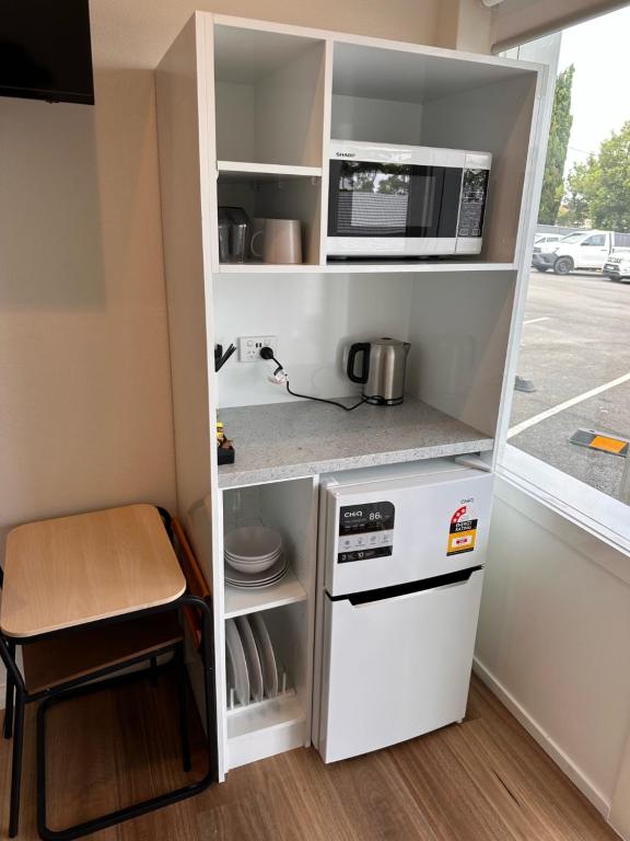 Kuchyň nebo kuchyňský kout v ubytování Surf Beach Motel Newcastle