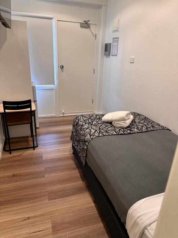 Postel nebo postele na pokoji v ubytování Surf Beach Motel Newcastle