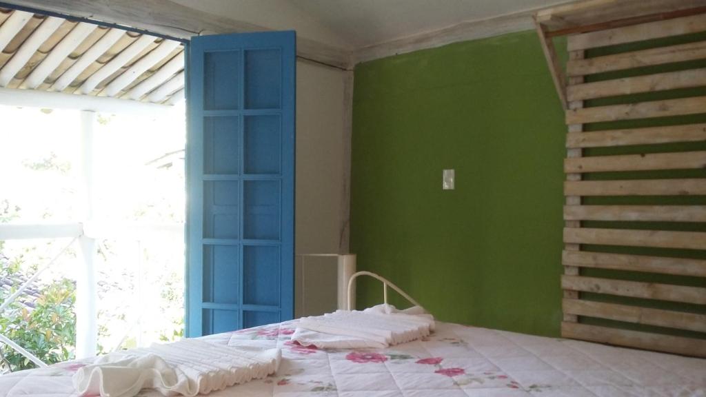Postel nebo postele na pokoji v ubytování Pousada Casa da Praia Itaúnas