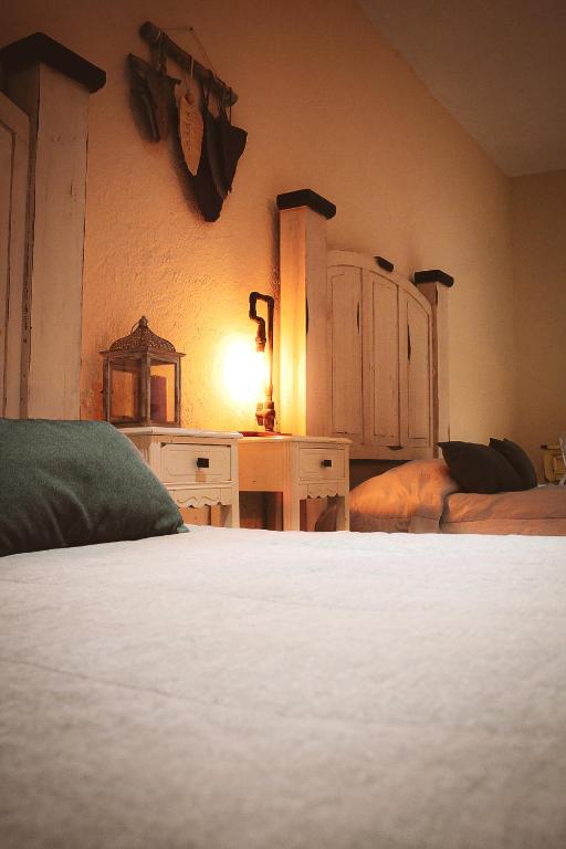 Postel nebo postele na pokoji v ubytování La Conspiración Hotel