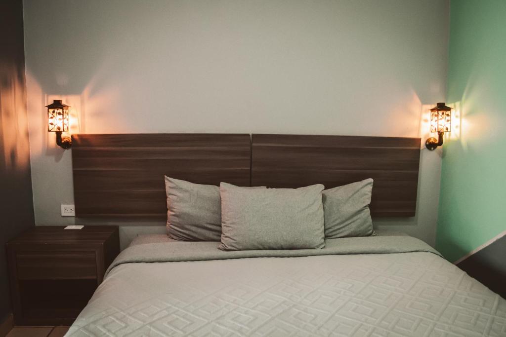 Postel nebo postele na pokoji v ubytování La Conspiración Hotel