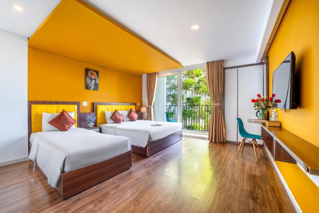 Postel nebo postele na pokoji v ubytování Rich Hotel