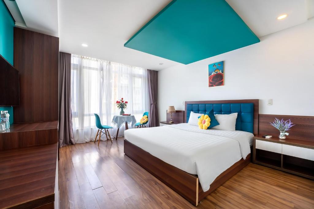 Postel nebo postele na pokoji v ubytování Rich Hotel