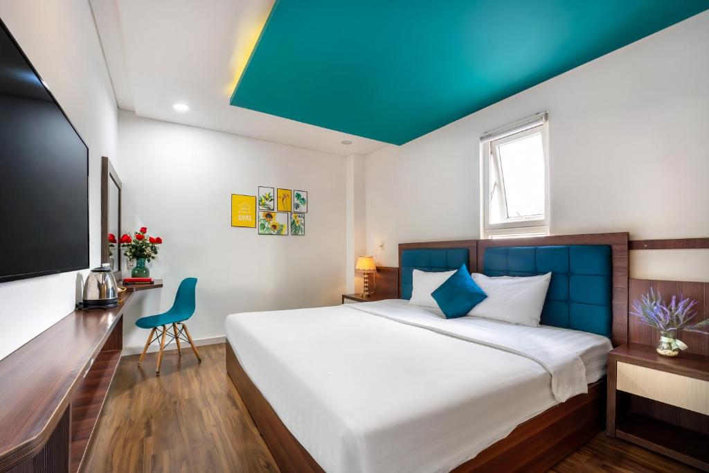 Postel nebo postele na pokoji v ubytování Rich Hotel