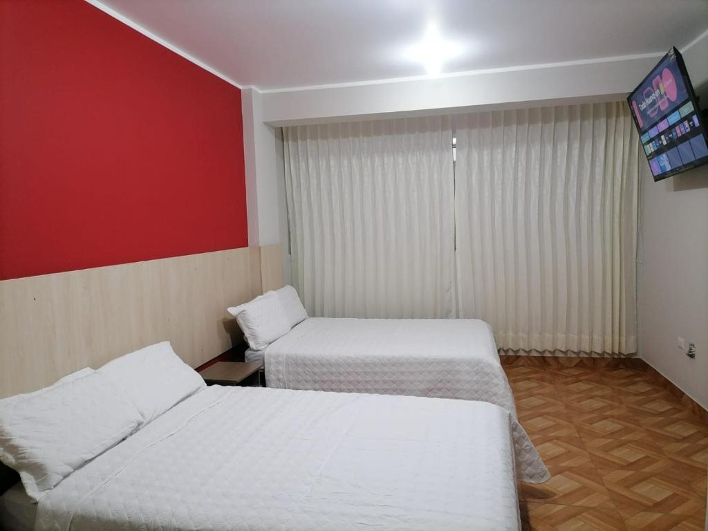 Postel nebo postele na pokoji v ubytování Hostal Terraoro