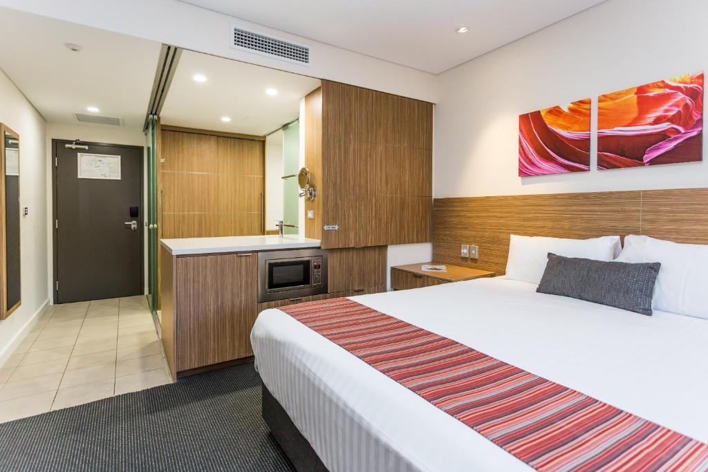 Ein Bett oder Betten in einem Zimmer der Unterkunft Country Comfort Perth
