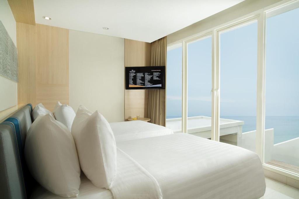 TV a/nebo společenská místnost v ubytování Hotel Santika Premiere Beach Resort Belitung