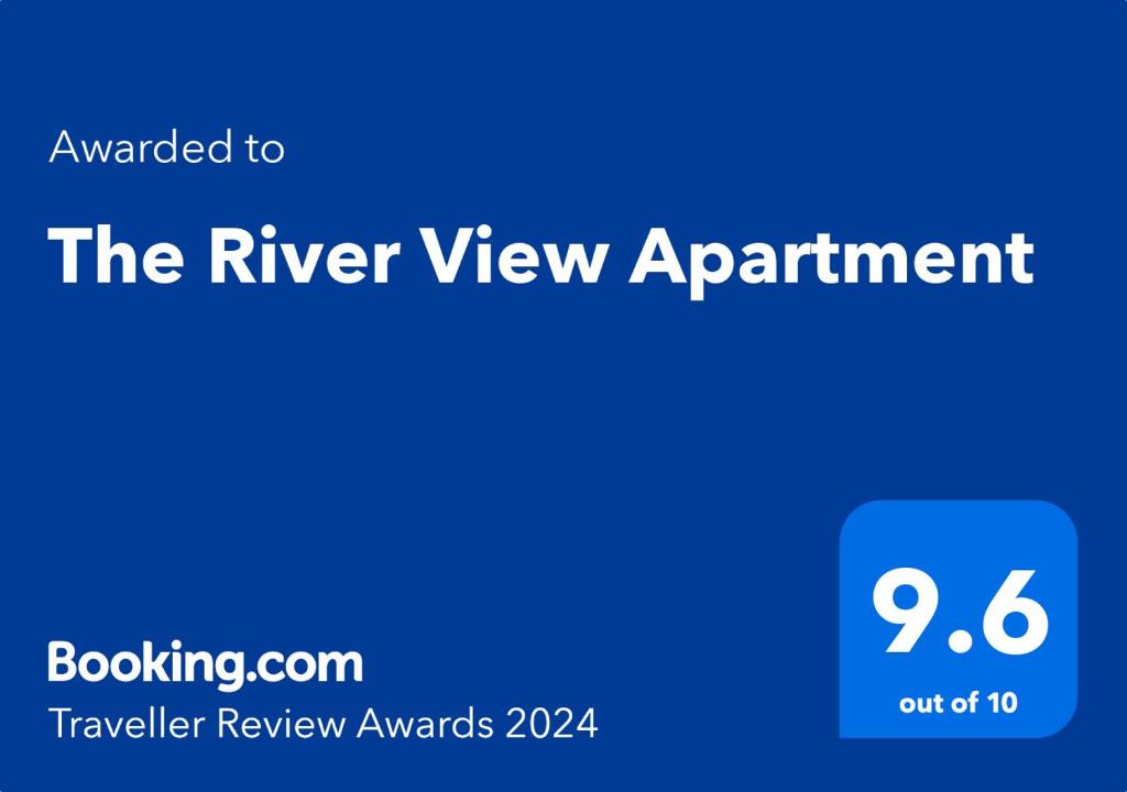 a blue sign that says the river view appointment at The River View Apartment in Rawalpindi