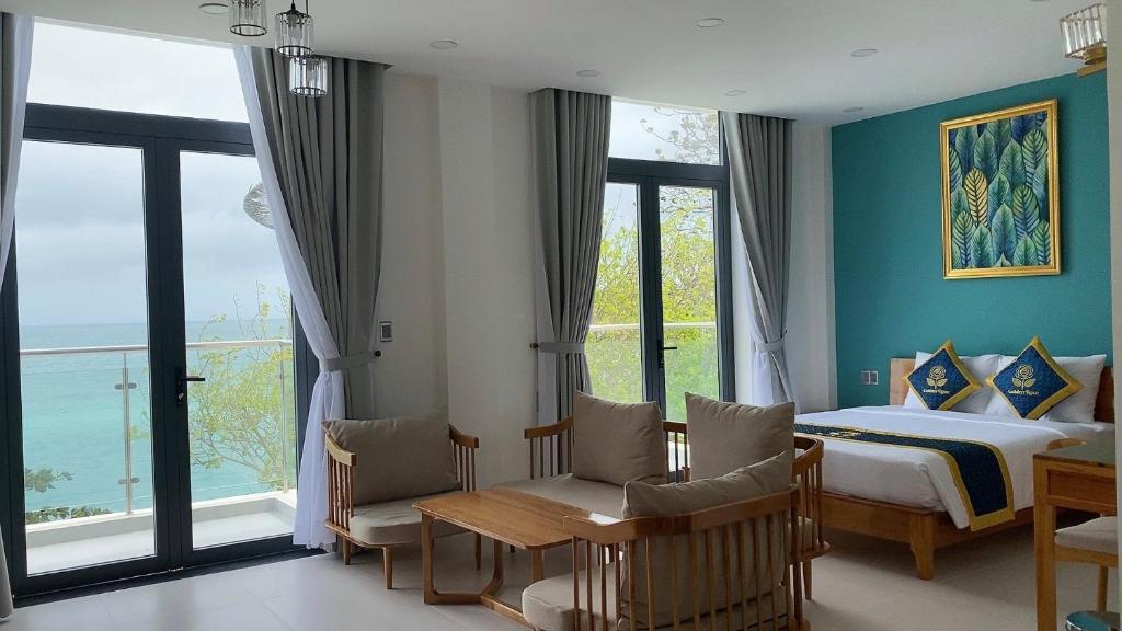 Postel nebo postele na pokoji v ubytování Golden Rose Hotel
