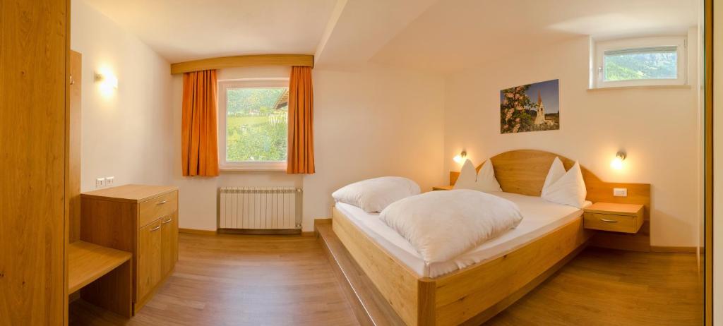 Postel nebo postele na pokoji v ubytování Plarserhof