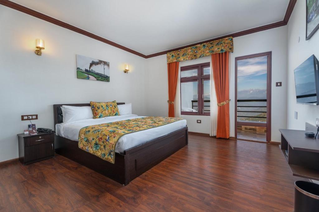 Postel nebo postele na pokoji v ubytování Summit Sherpa Mountain Hotel & Spa