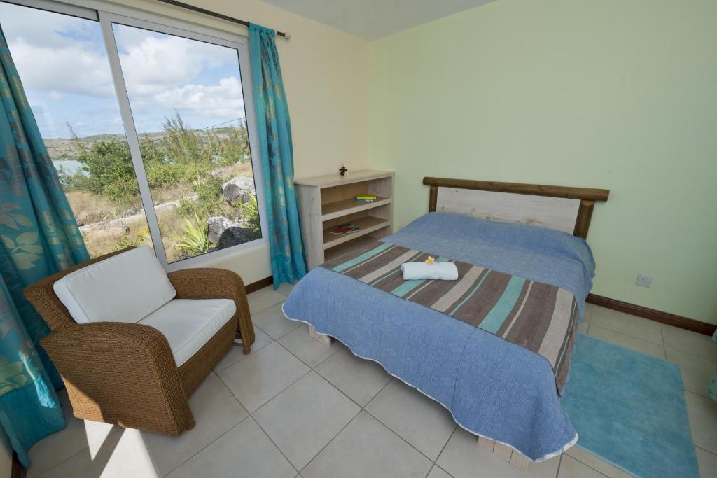 Postel nebo postele na pokoji v ubytování Le Refuge