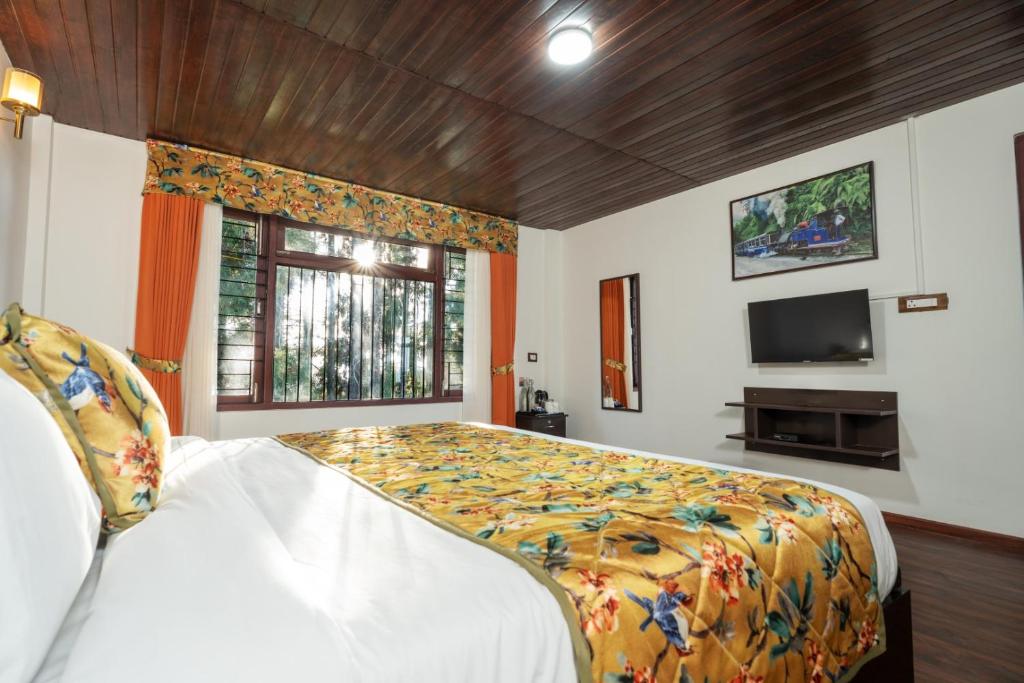 Postel nebo postele na pokoji v ubytování Summit Sherpa Mountain Hotel & Spa