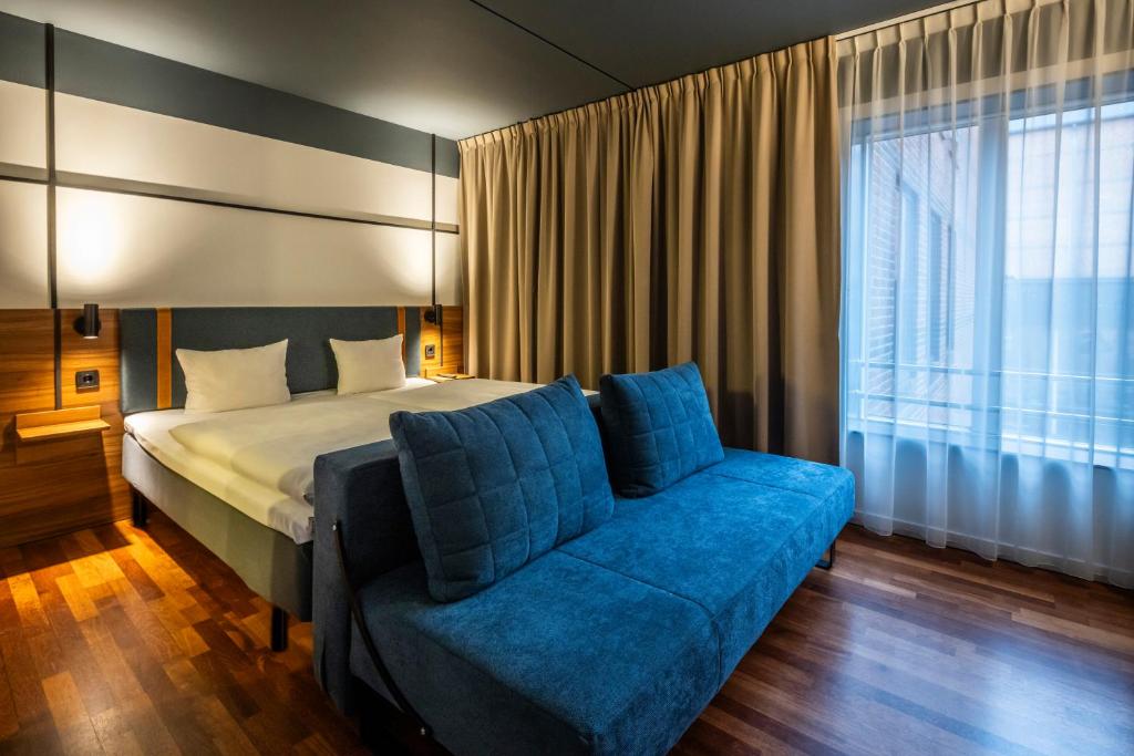 Postel nebo postele na pokoji v ubytování Comfort Hotel Vesterbro